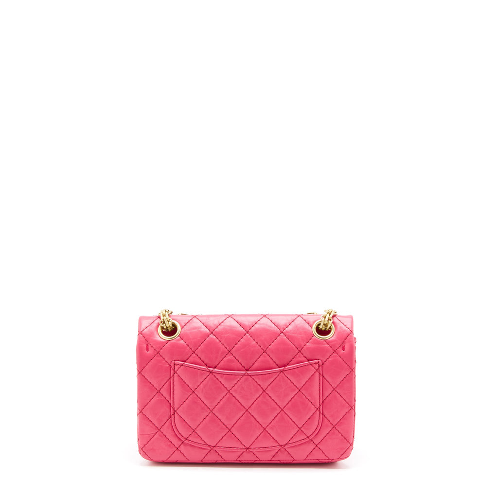 CHANEL MINI 2.55 REISSUE FLAP BAG AGED CALFSKIN HOT PINK GHW
