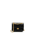 CHANEL MINI 2.55 REISSUE FLAP BAG AGED CALFSKIN BLACK BRUSHED GHW (MICROCHIP)