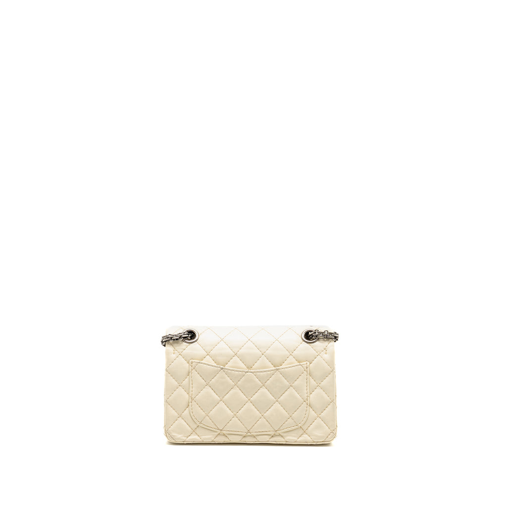 CHANEL MINI 2.55 REISSUE FLAP BAG AGED CALFSKIN CREAMY WHITE WITH RUTHENIUM HARDWARE