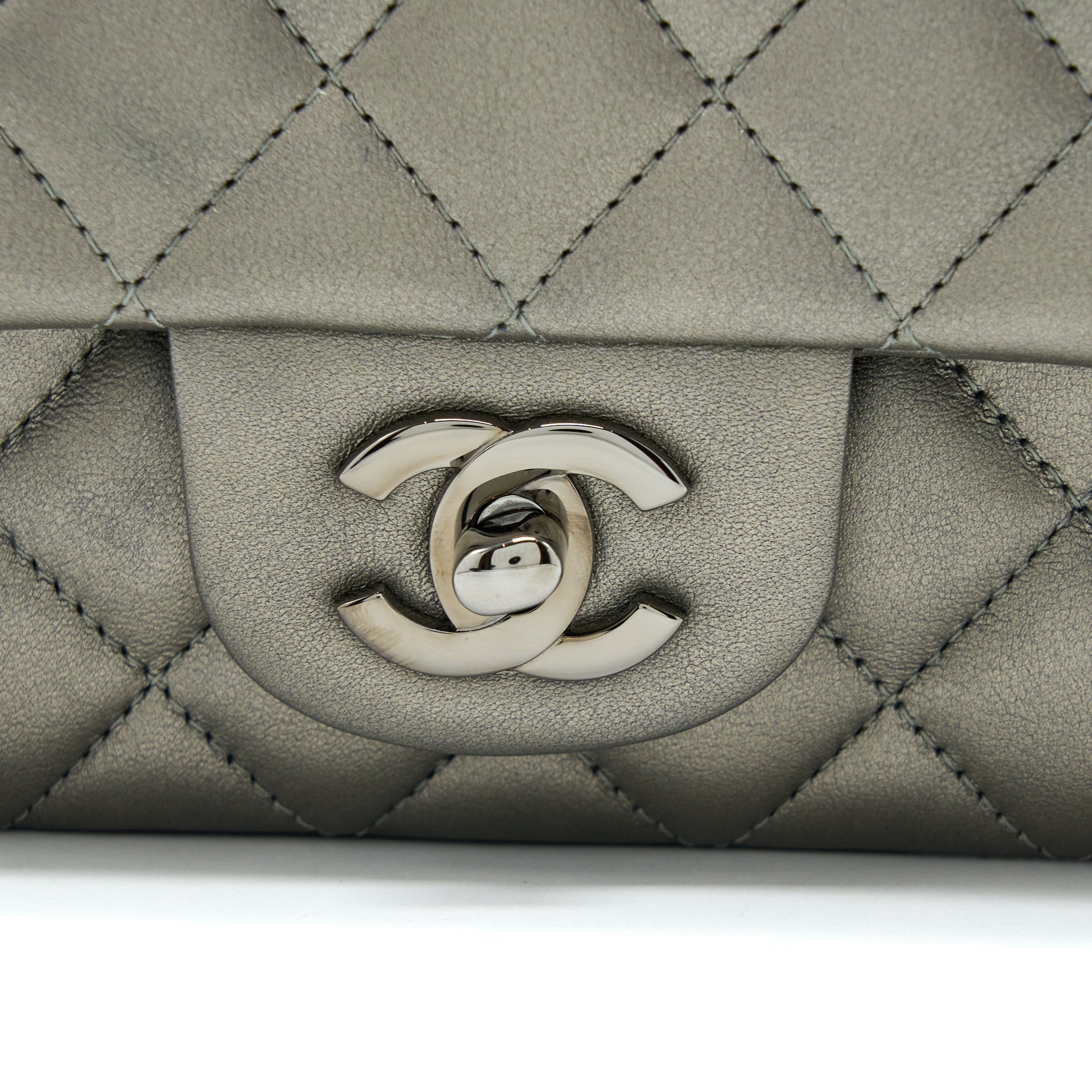 CHANEL 21B MINI RECTANGULAR FLAP BAG CALFSKIN METALLIC SILVER WITH SHINY RUTHENIUM HARDWARE (MICROCHIP)