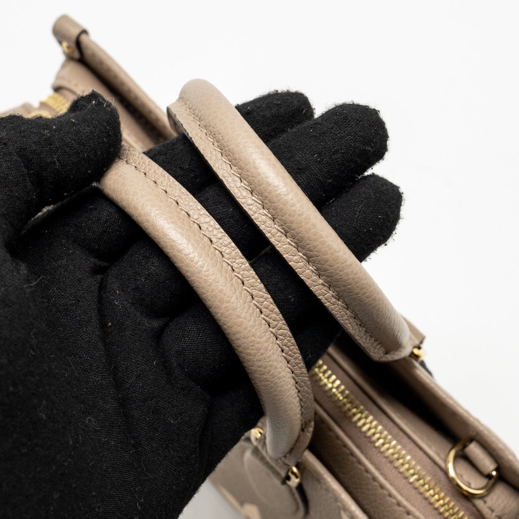 LOUIS VUITTON ONTHEGO EAST WEST MONOGRAM EMPREINTE LEATHER DOVE/CREAM GHW