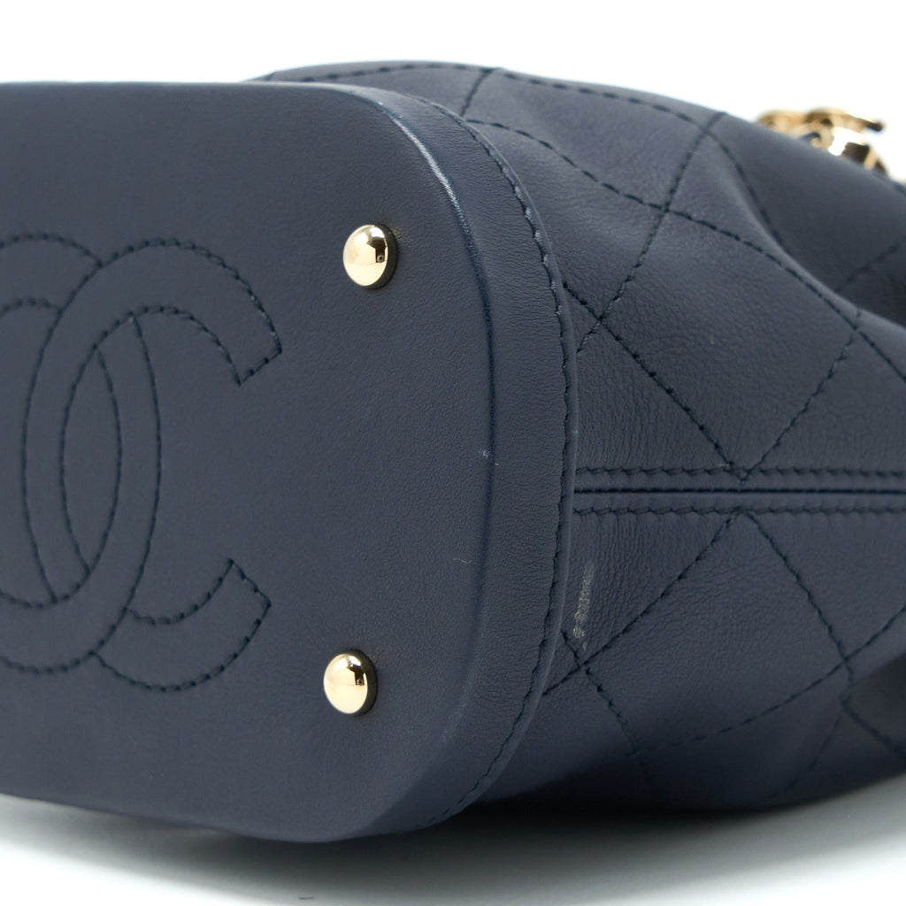 CHANEL MINI DRAWSTRING BUCKET BAG LAMBSKIN NAVY GHW
