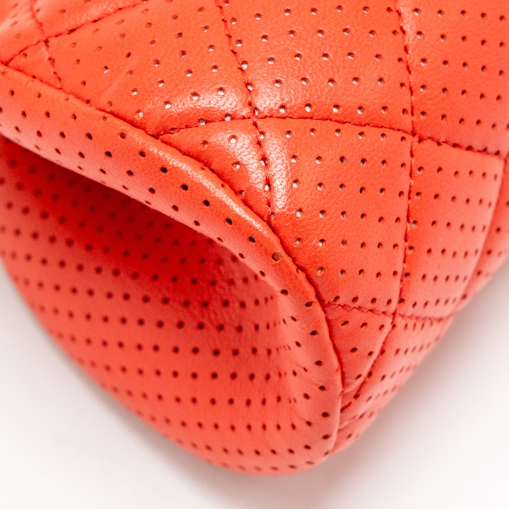 CHANEL CC CLUTCH BAG PERFORATED LAMBSKIN RED SHW