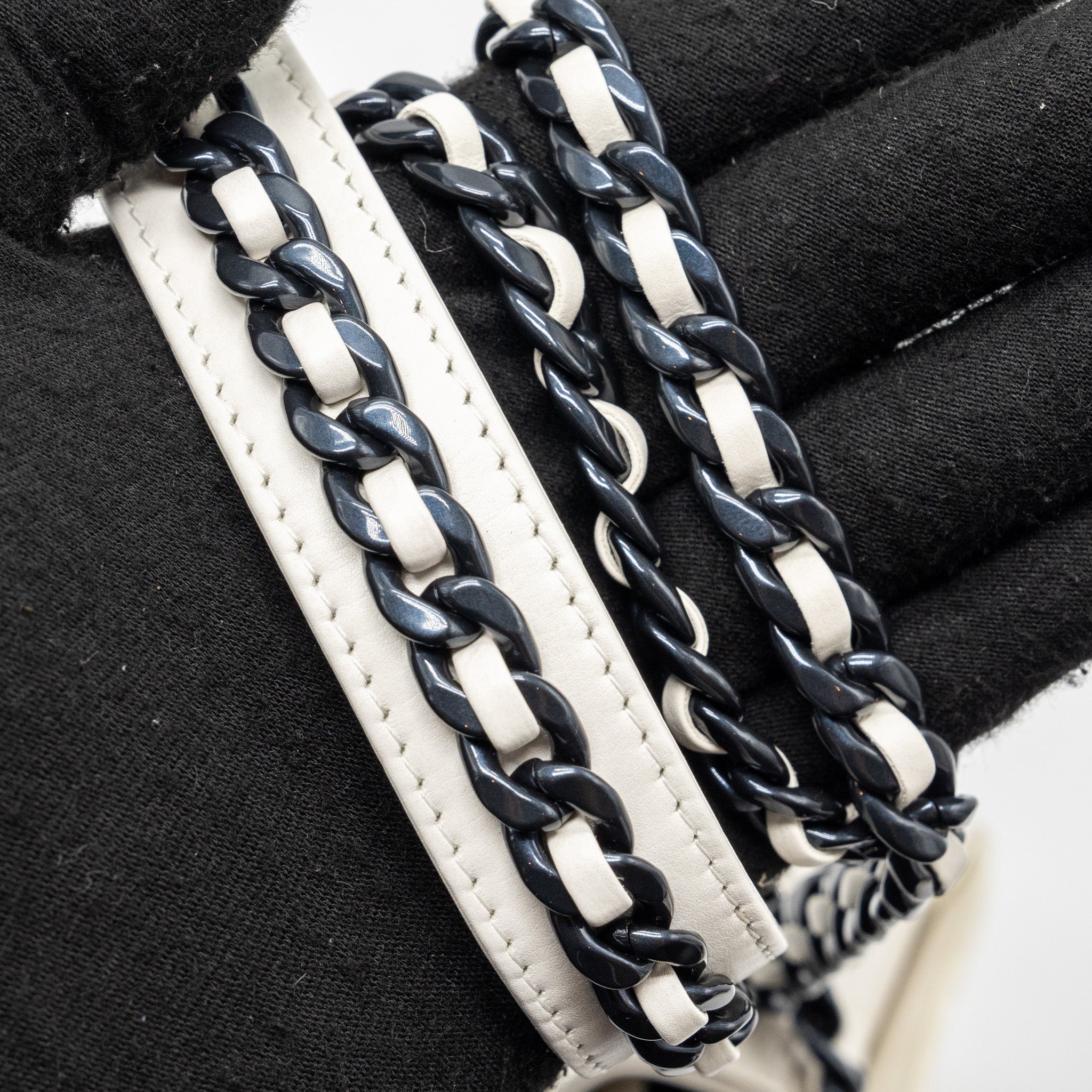 CHANEL VERTICAL 19 PHONE CASE LAMBSKIN WHITE WITH BLACK HARDWARE