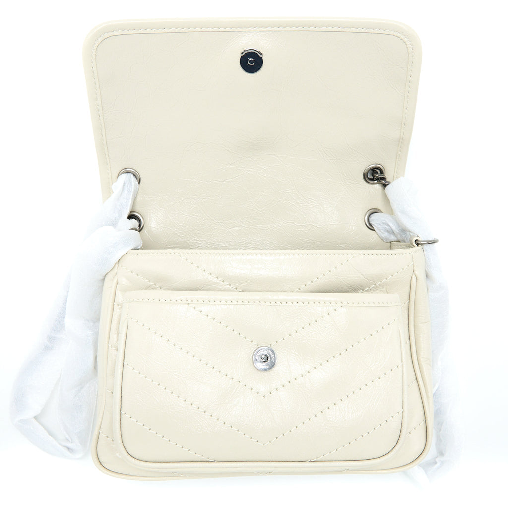 SAINT LAURENT NIKI BABY CHAIN BAG IN CRINKLED CALFSKIN BLANC SHW