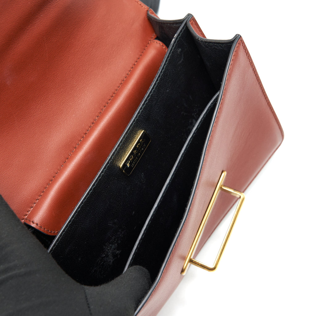 PRADA LEATHER CASHIER BAG BURGUNDY/ BLACK GHW