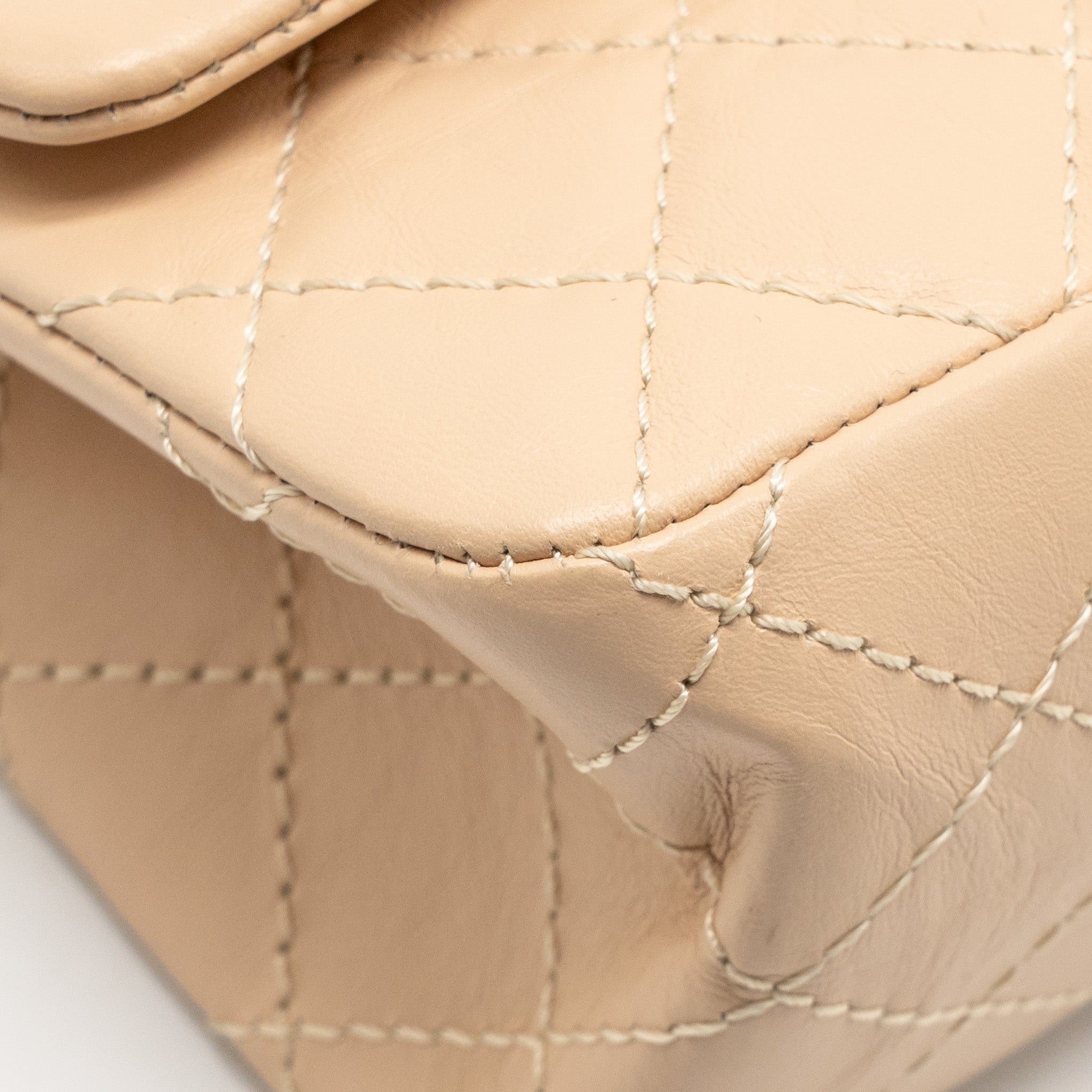 CHANEL SMALL 2.55 REISSUE DOUBLE FLAP BAG AGED CALFSKIN BEIGE GHW