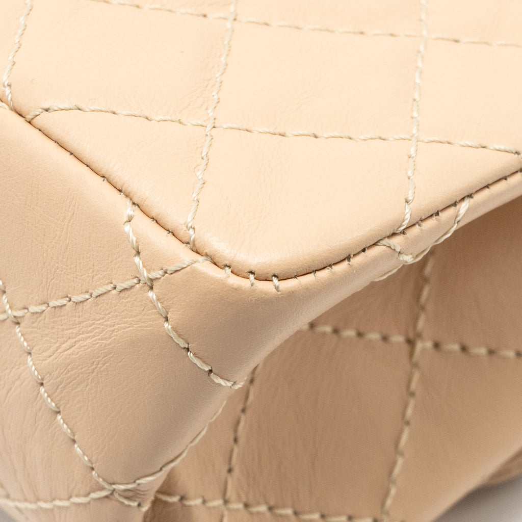 CHANEL SMALL 2.55 REISSUE DOUBLE FLAP BAG AGED CALFSKIN BEIGE GHW