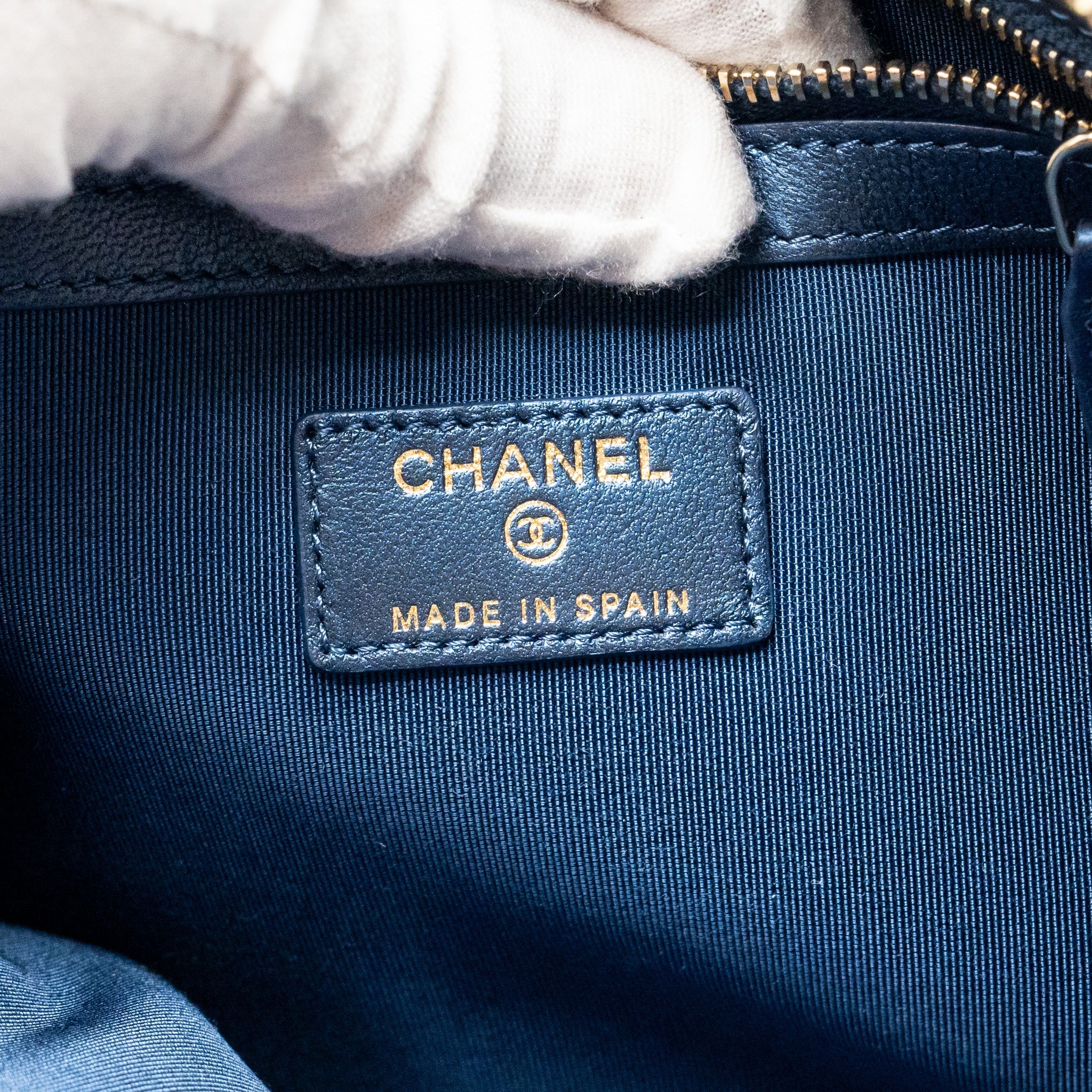 CHANEL BOY CLUTCH CALFSKIN PEARLY BLUE GHW