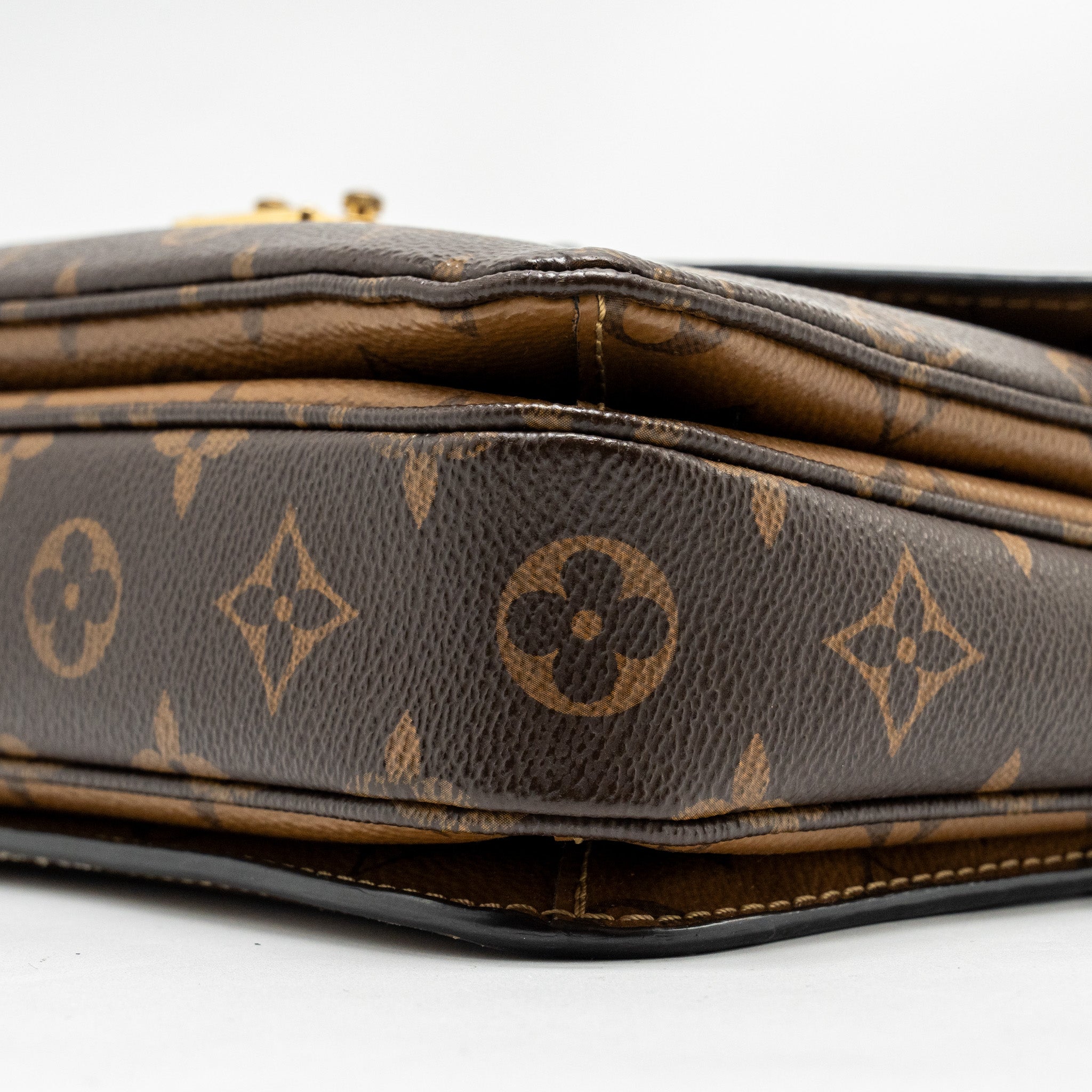 LOUIS VUITTON POCHETTE MÉTIS MONOGRAM REVERSE CANVAS GHW