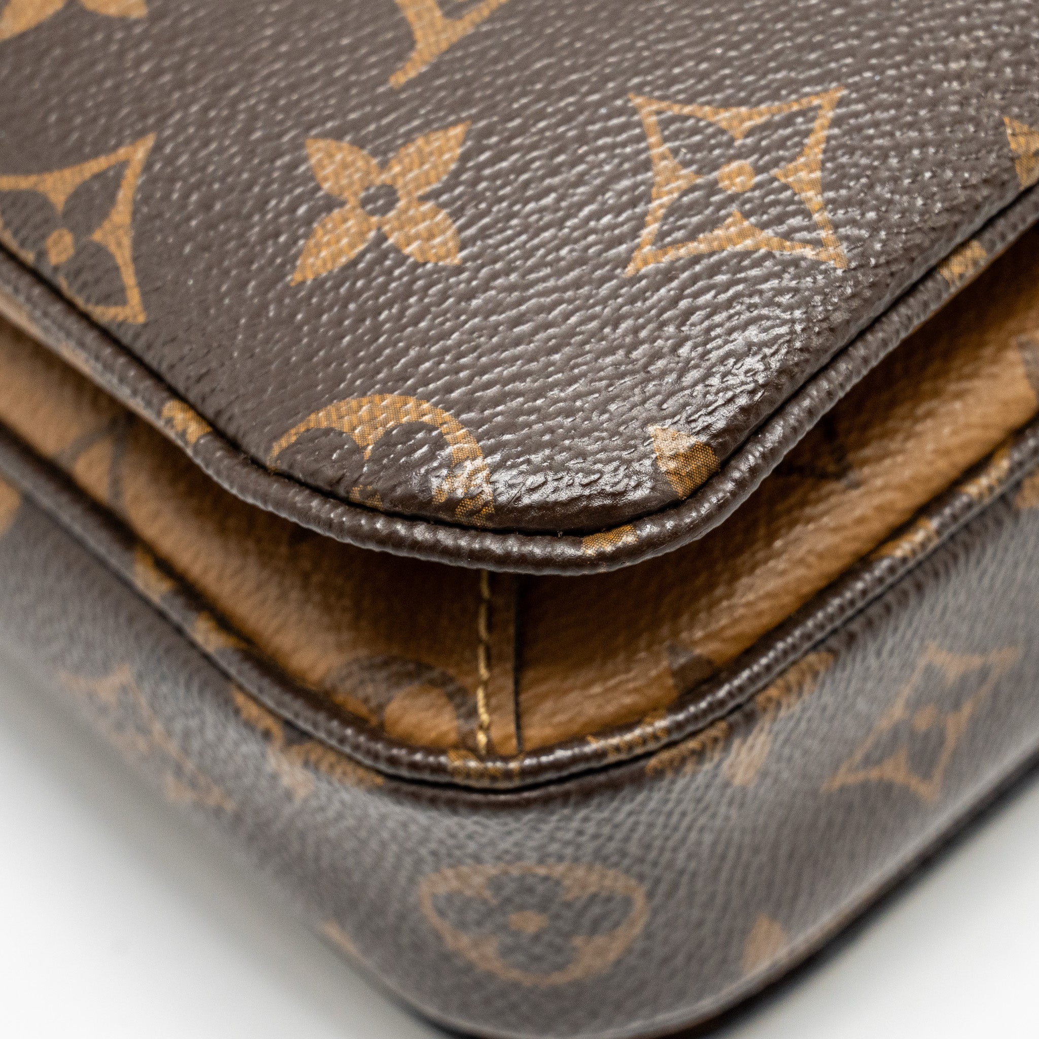 LOUIS VUITTON POCHETTE MÉTIS MONOGRAM REVERSE CANVAS GHW