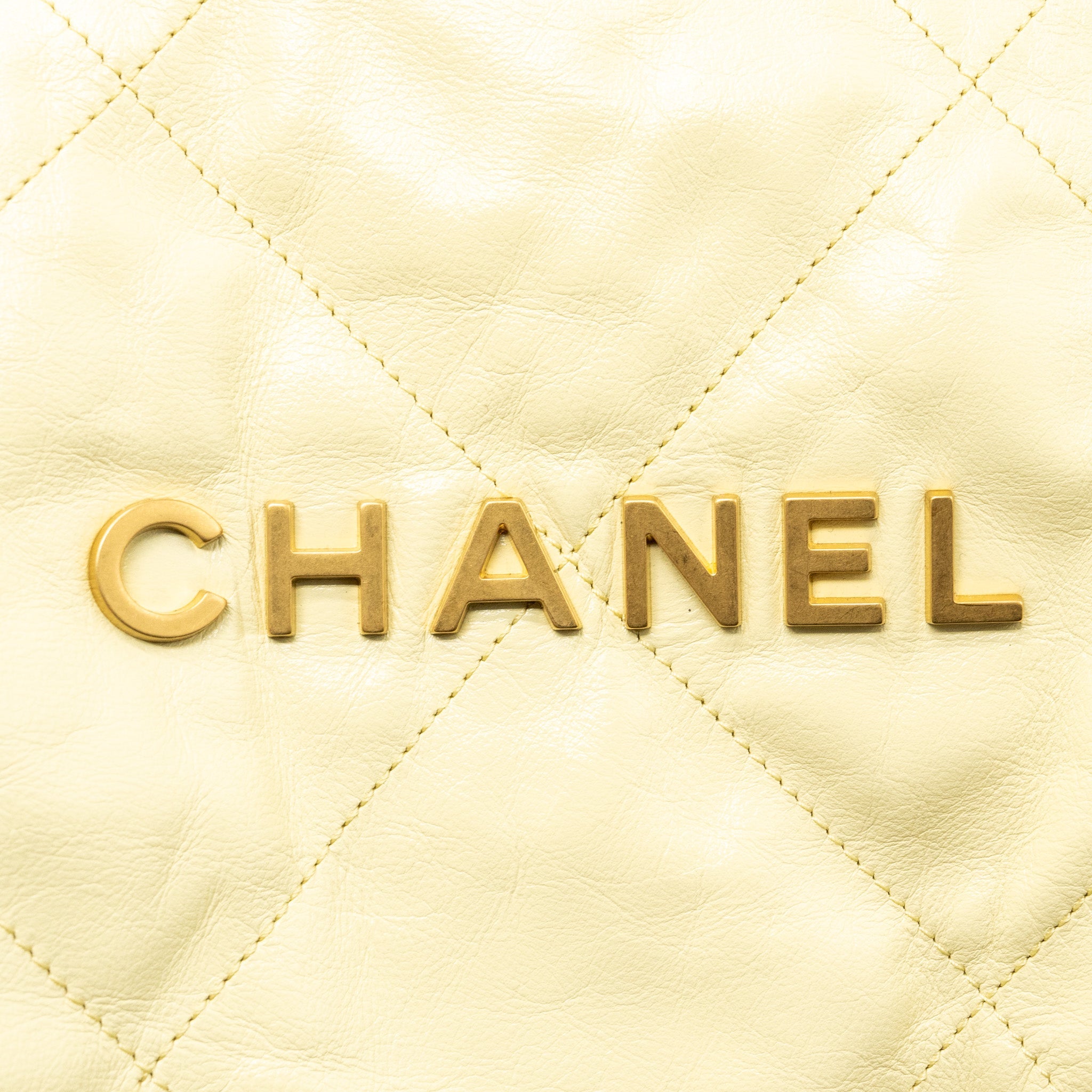 CHANEL 23P SMALL 22 BACKPACK SHINY CALFSKIN LIGHT YELLOW BRUSHED GHW(MICROCHIP)