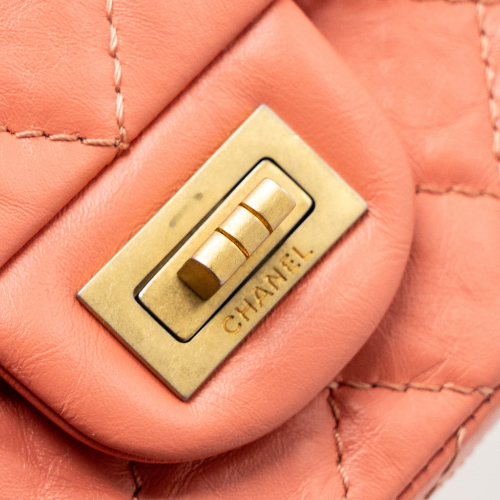 CHANEL SMALL 2.55 REISSUE FLAP BAG AGED CALFSKIN LIGHT PINK GHW
