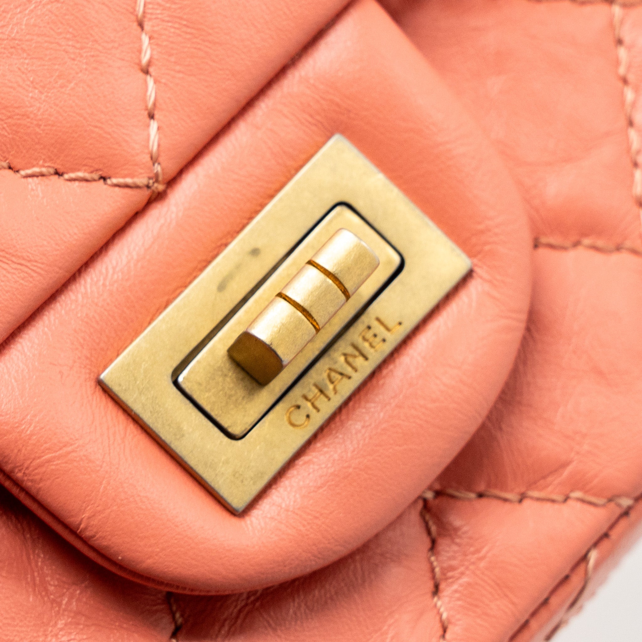 CHANEL SMALL 2.55 REISSUE FLAP BAG AGED CALFSKIN LIGHT PINK GHW