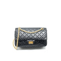 CHANEL 2.55 REISSUE SMALL FLAP BAG AGED CALFSKIN IN BLACK GHW