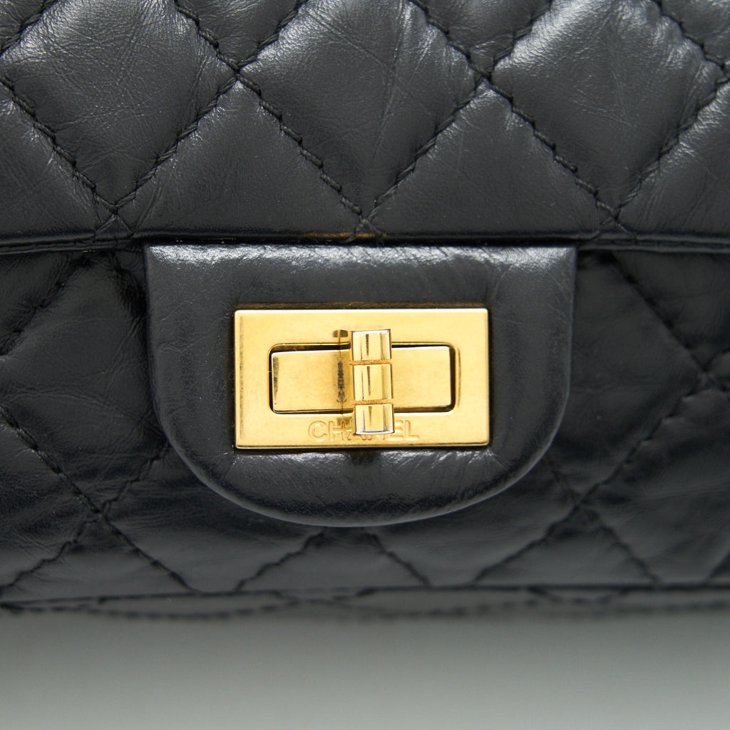 CHANEL 2.55 REISSUE SMALL FLAP BAG AGED CALFSKIN IN BLACK GHW
