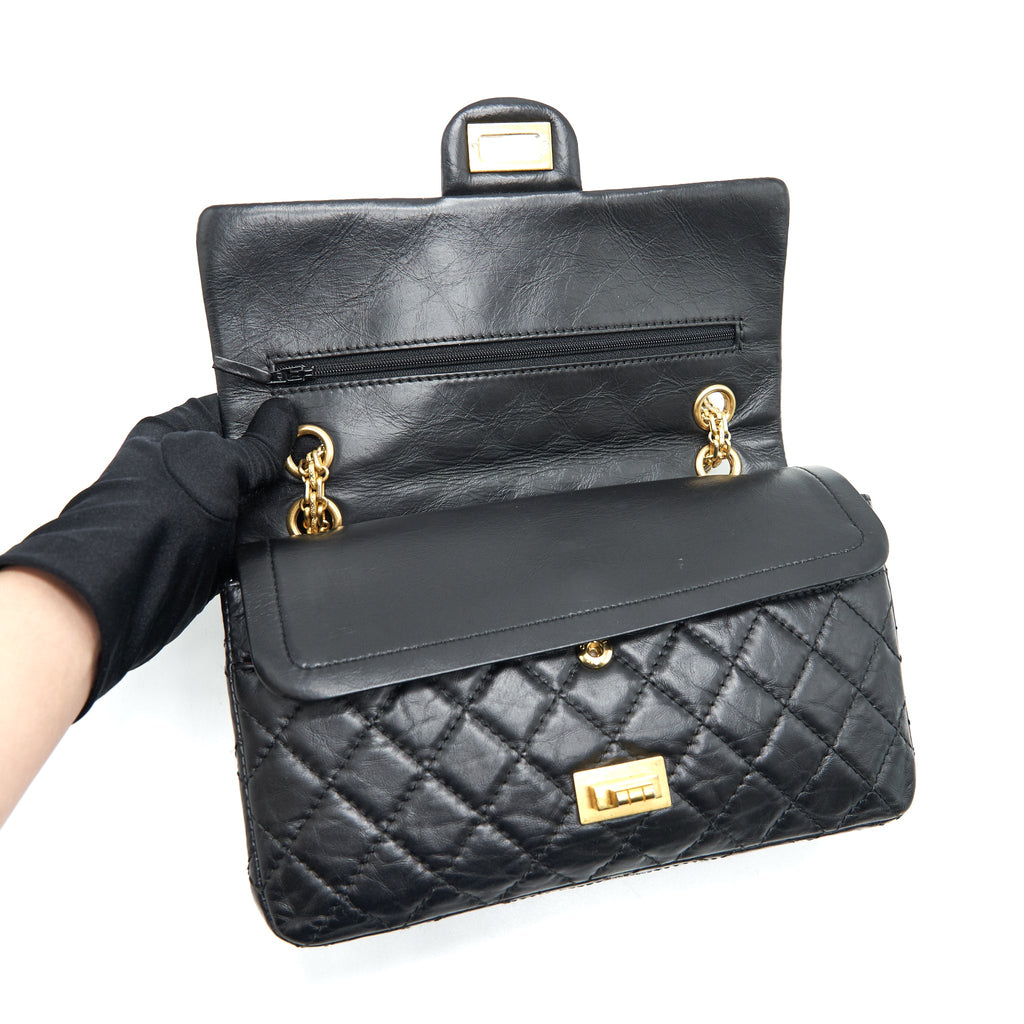 CHANEL 2.55 REISSUE SMALL FLAP BAG AGED CALFSKIN IN BLACK GHW