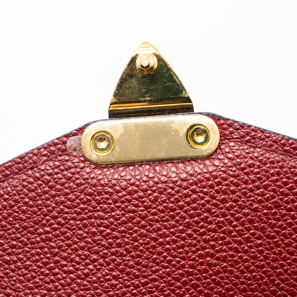 LOUIS VUITTON POCHETTE MÉTIS MONOGRAM EMPREINTE RED GHW