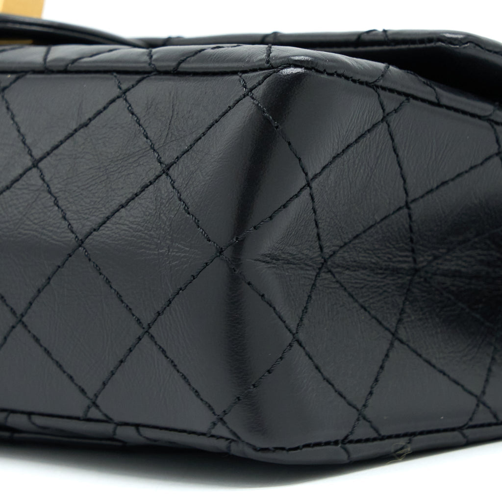 CHANEL SMALL 2.55 REISSUE FLAP BAG AGED CALFSKIN BLACK BRUSHED GHW (MICROCHIP)