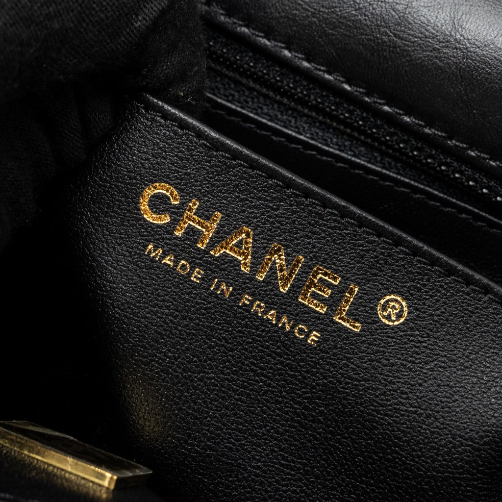 CHANEL MINI 2.55 REISSUE FLAP BAG AGED CALFSKIN BLACK GHW (MICROCHIP)