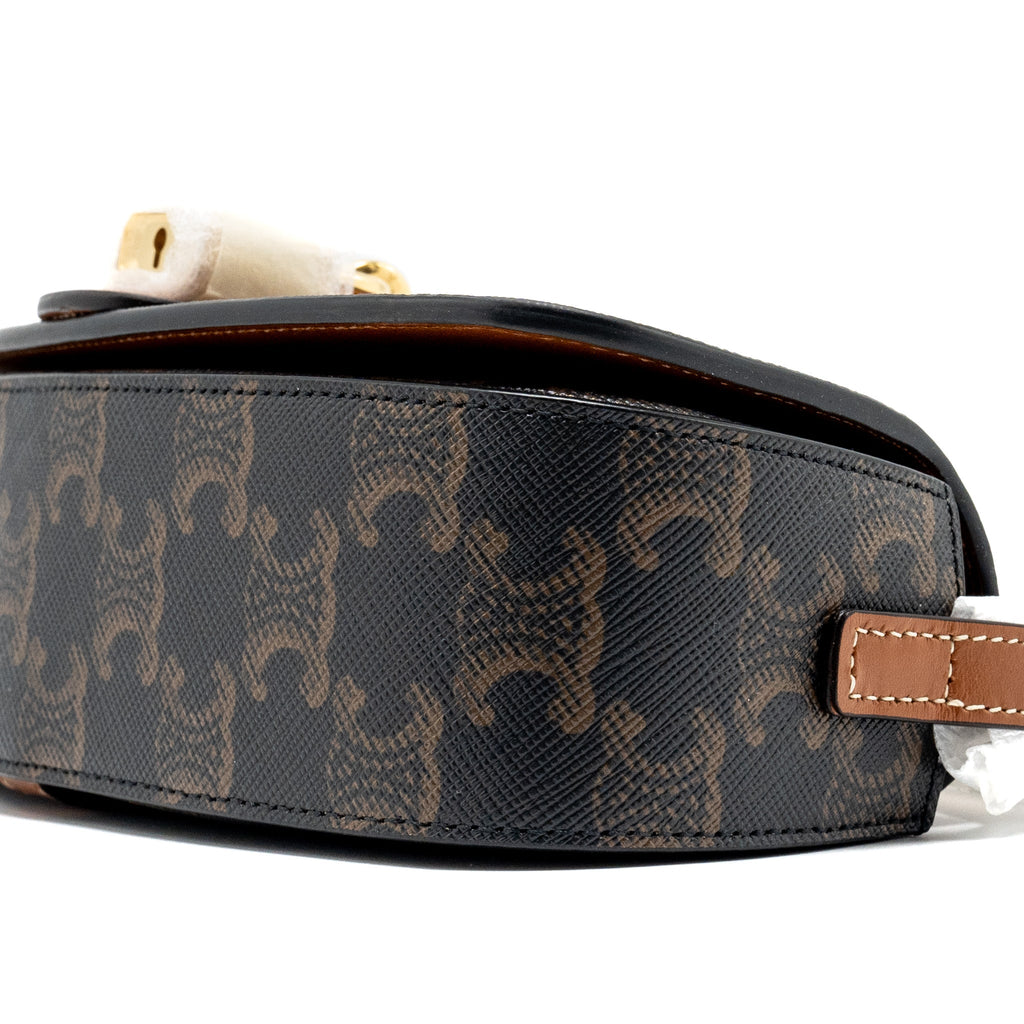 CELINE CLUTCH ON STRAP TABOU IN TRIOMPHE CANVAS / CALFSKIN TAN GHW