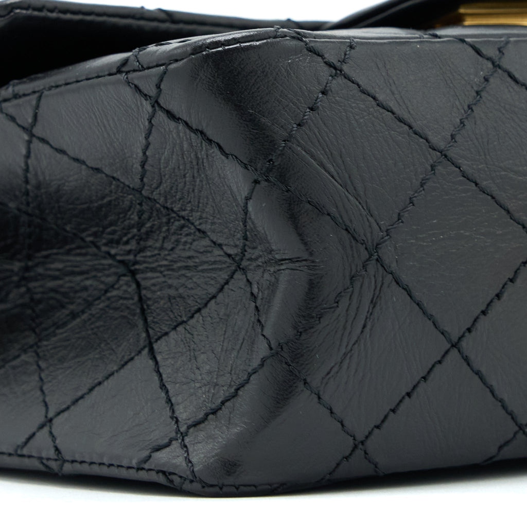 CHANEL MINI 2.55 REISSUE FLAP BAG AGED CALFSKIN BLACK BRUSHED GHW (MICROCHIP)