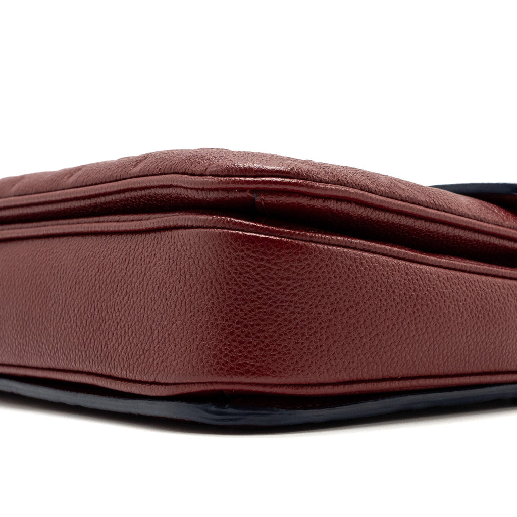 LOUIS VUITTON POCHETTE MÉTIS MONOGRAM EMPREINTE RED GHW