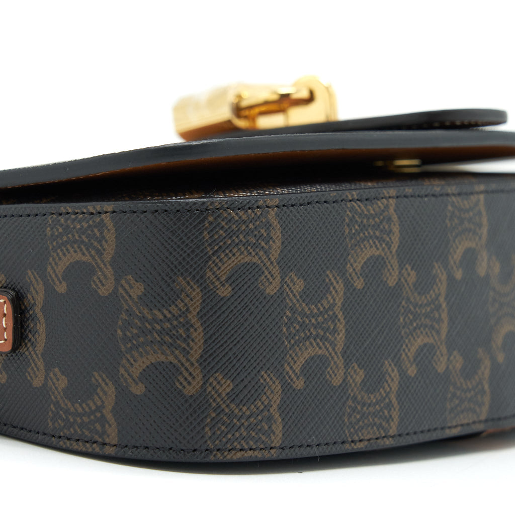 CELINE CLUTCH ON STRAP IN TRIUMPHED CANVAS/CALFSKIN TAN GHW