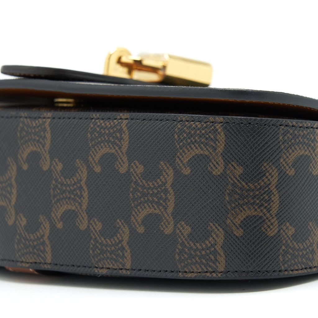 CELINE CLUTCH ON STRAP IN TRIUMPHED CANVAS/CALFSKIN TAN GHW