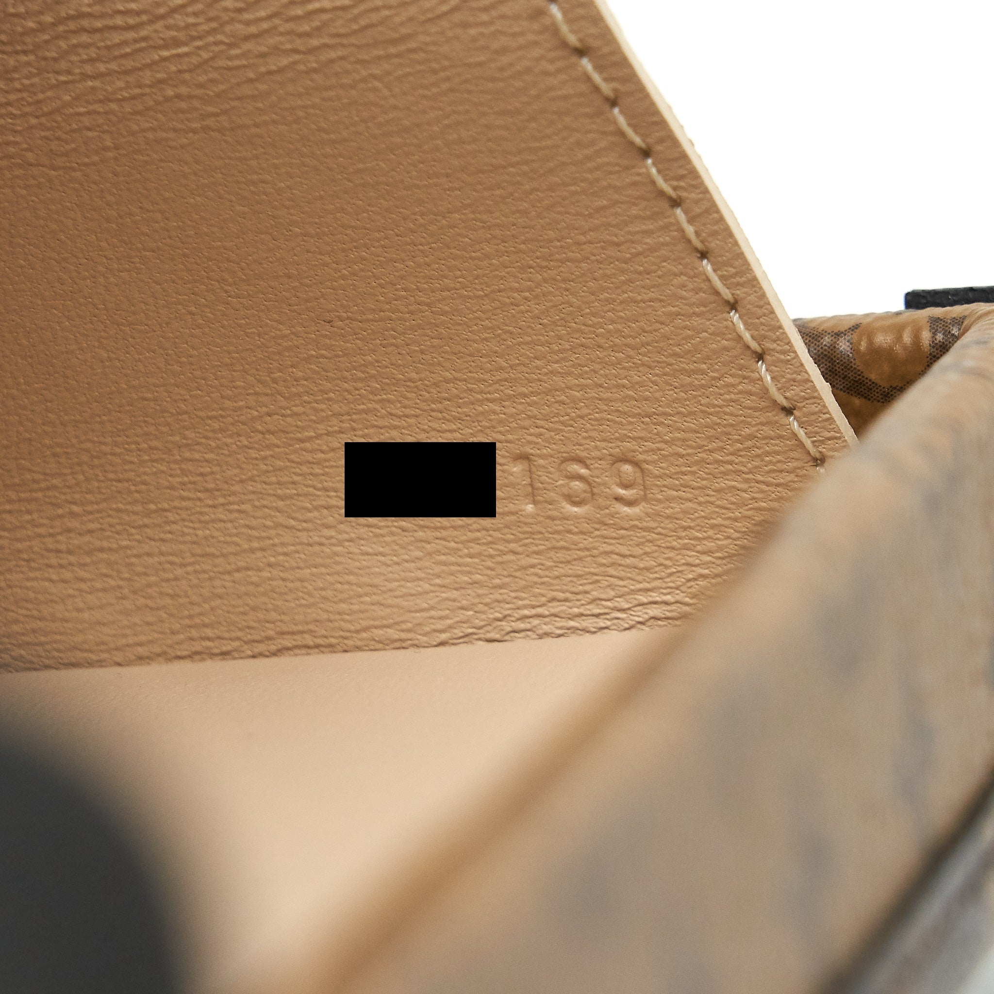 LOUIS VUITTON PETITE MALLE MONOGRAM REVERSE CANVAS
