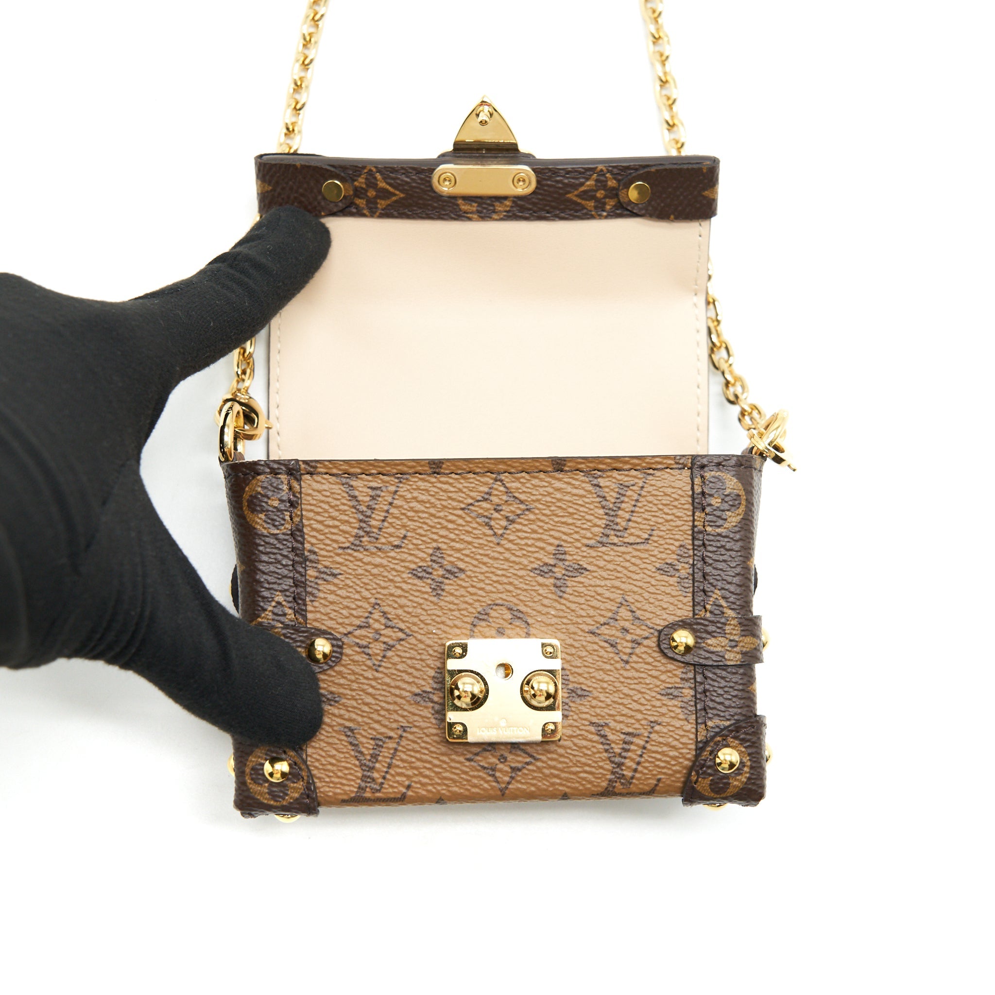 LOUIS VUITTON ESSENTIAL TRUNK WITH CHAIN REVERSE MONOGRAM