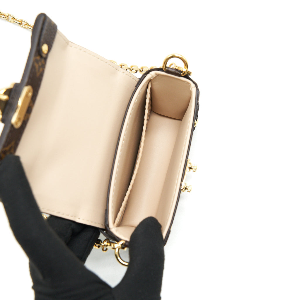 LOUIS VUITTON ESSENTIAL TRUNK WITH CHAIN REVERSE MONOGRAM