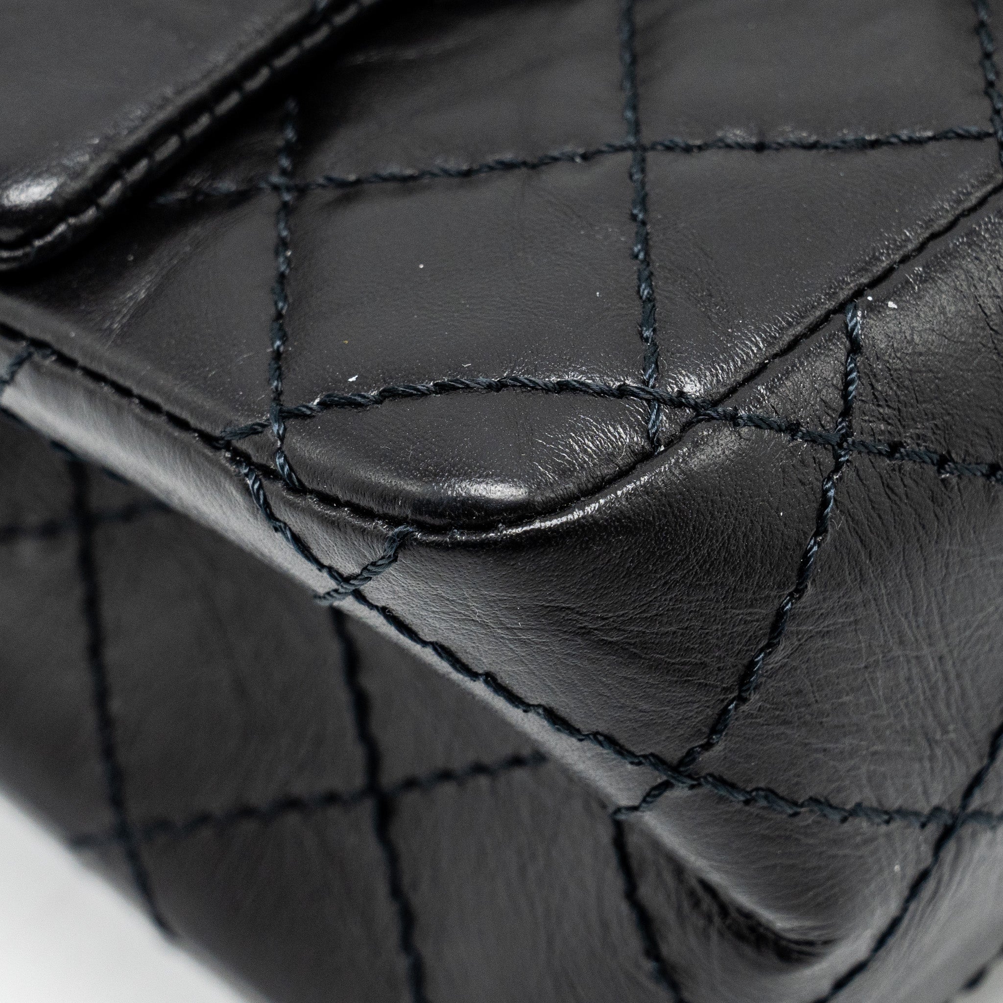 CHANEL MINI 2.55 REISSUE FLAP BAG AGED CALFSKIN BLACK GHW