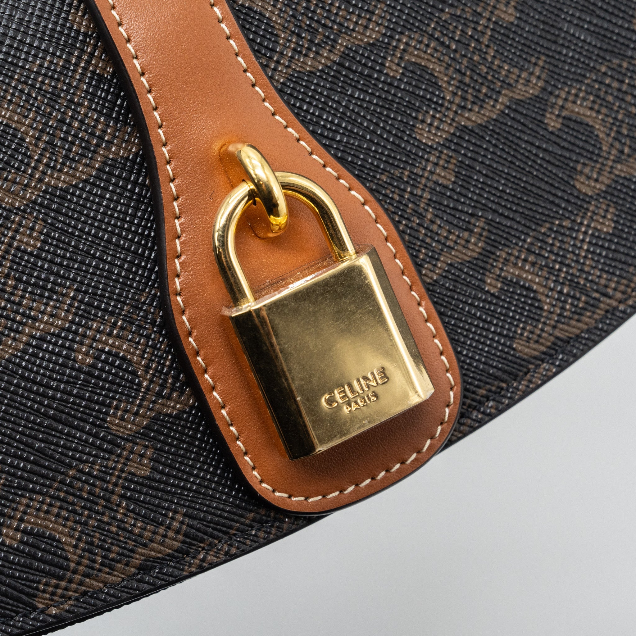 CELINE CLUTCH ON STRAP TABOU TRIOMPHE CANVAS/ CALFSKIN TAN GHW