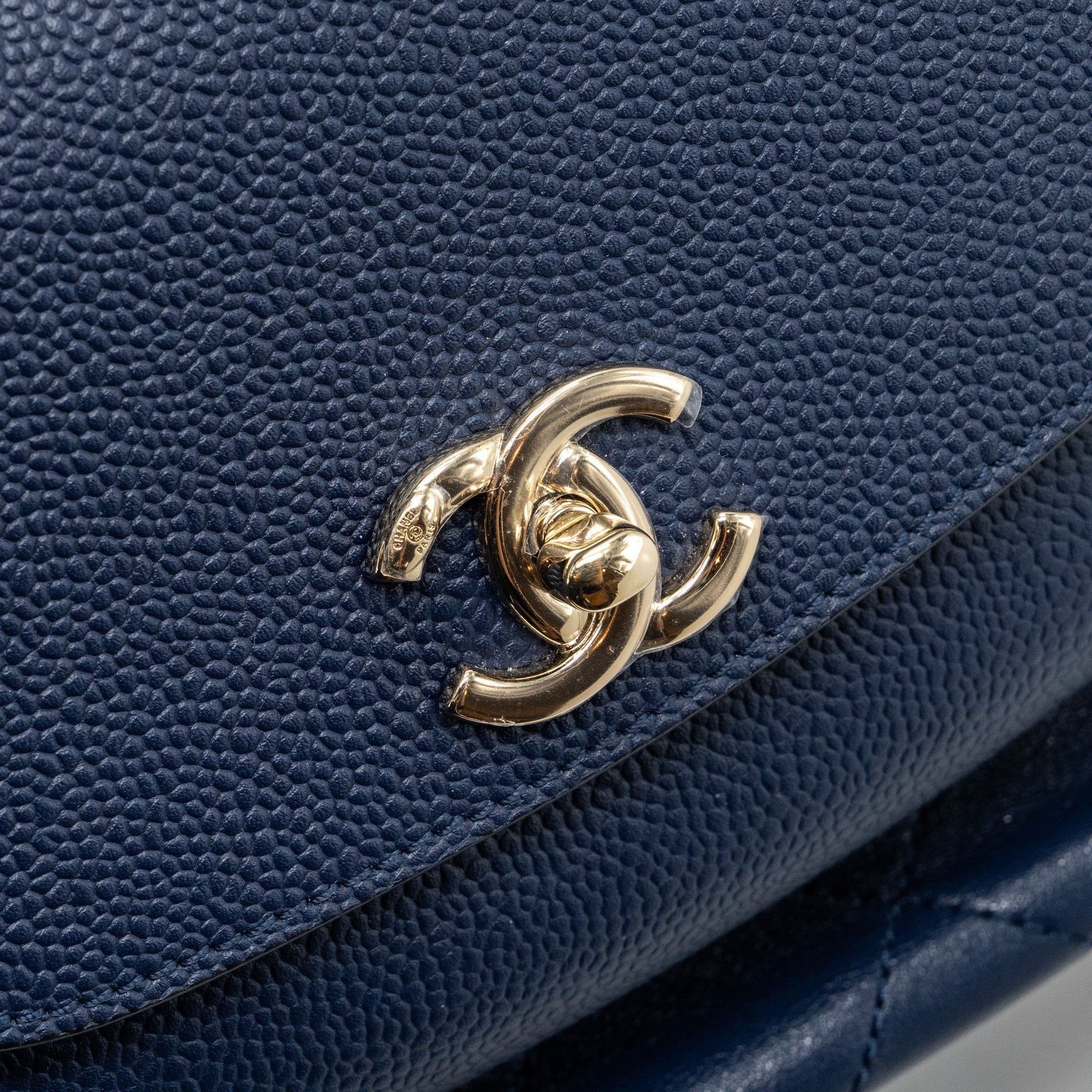 CHANEL DRAWSTRING BACKPACK LAMBSKIN / GRAINED CALFSKIN DARK BLUE LGHW