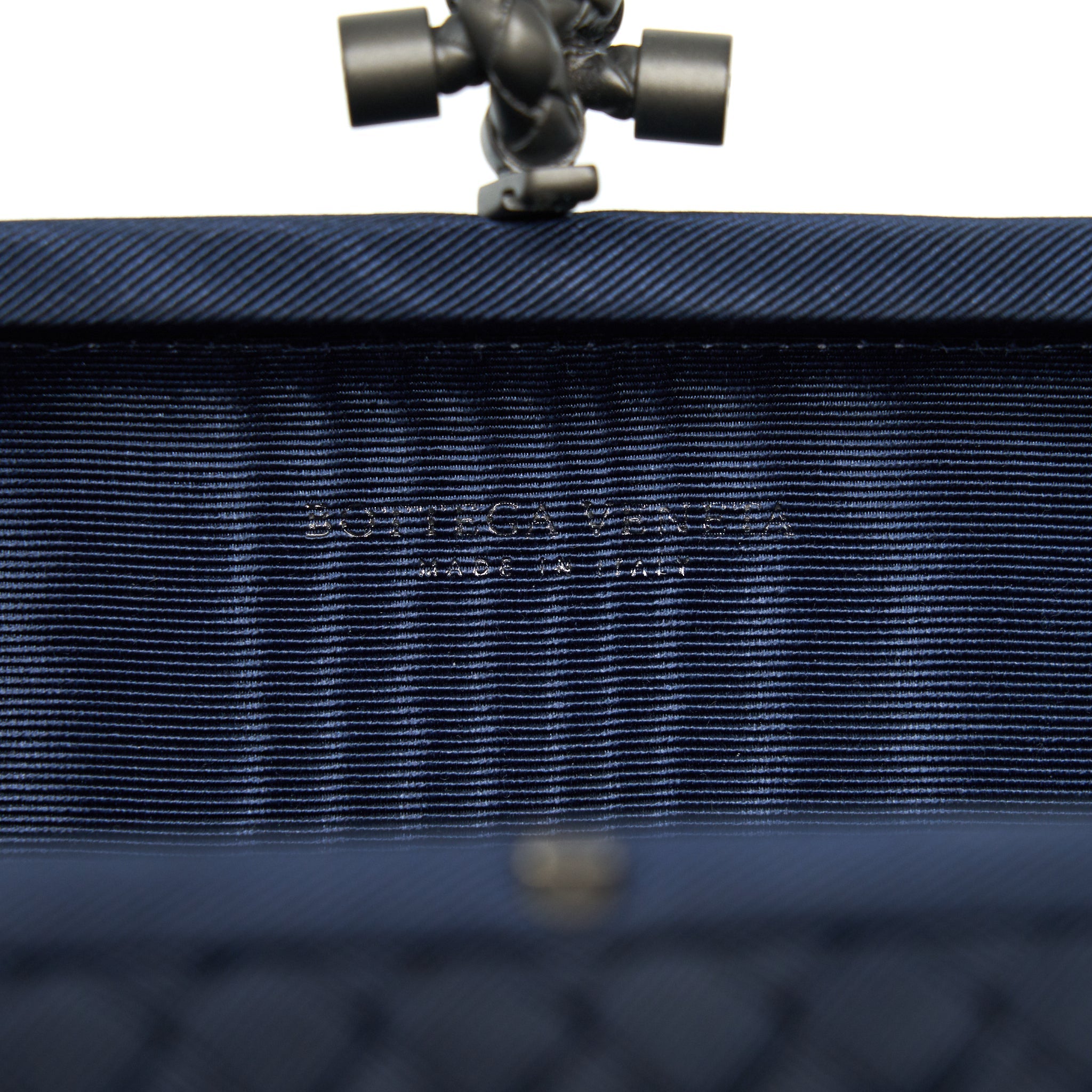 BOTTEGA VENETA KNOT CLUTCH IN NAVY WITH RUTHENIUM HARDWARE