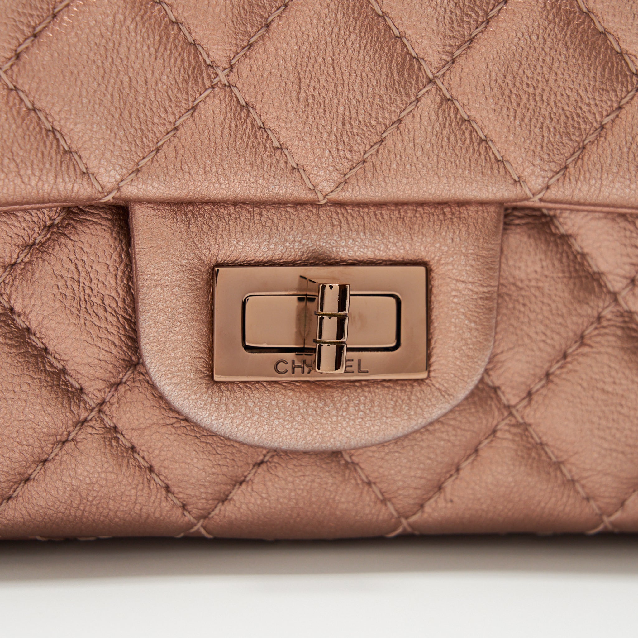 CHANEL MINI 2.55 REISSUE FLAP BAG CALFSKIN METALLIC PINK (MICROCHIP)