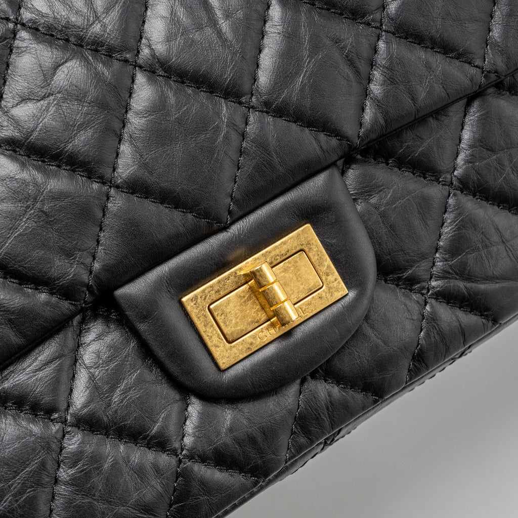 CHANEL MAXI 2.55 REISSUE FLAP BAG AGED CALFSKIN BLACK GHW