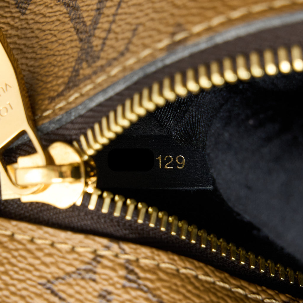 LOUIS VUITTON POCHETTE MÉTIS MONOGRAM REVERSE CANVAS GHW
