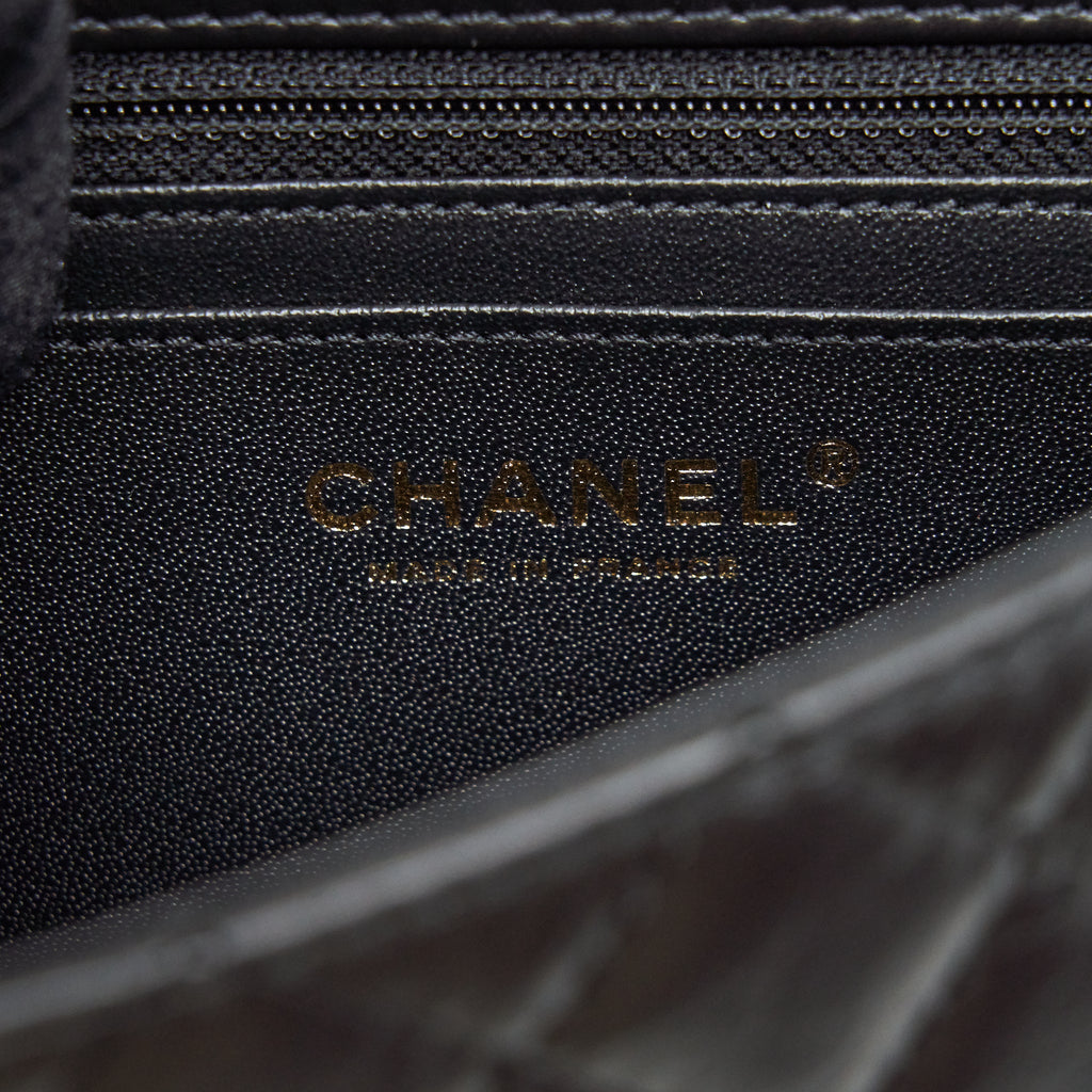 CHANEL MINI 2.55 REISSUE FLAP BAG AGED CALFSKIN BLACK BRUSHED GHW (MICROCHIP)