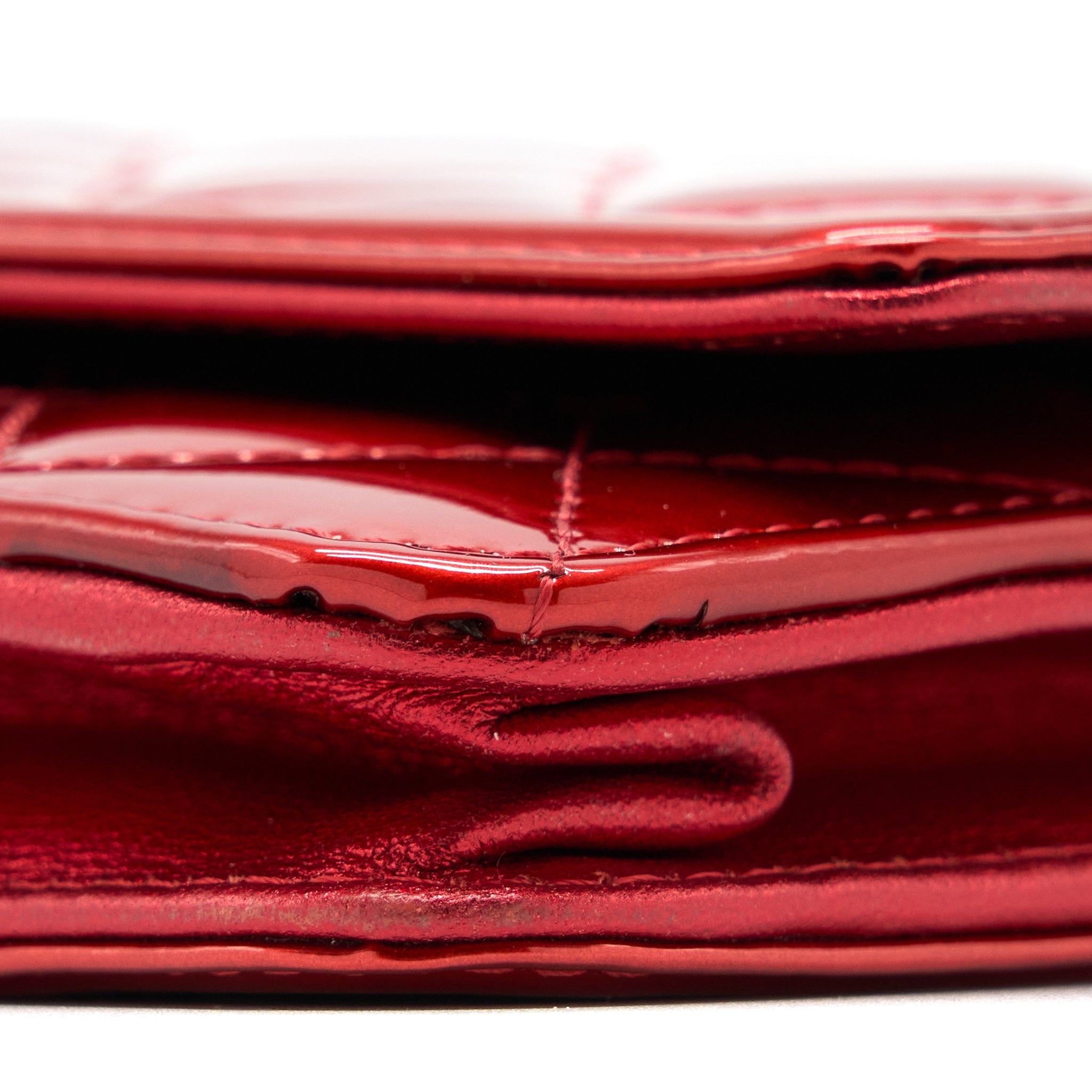 CHANEL BOY WALLET ON CHAIN PATENT METALLIC RED SHW