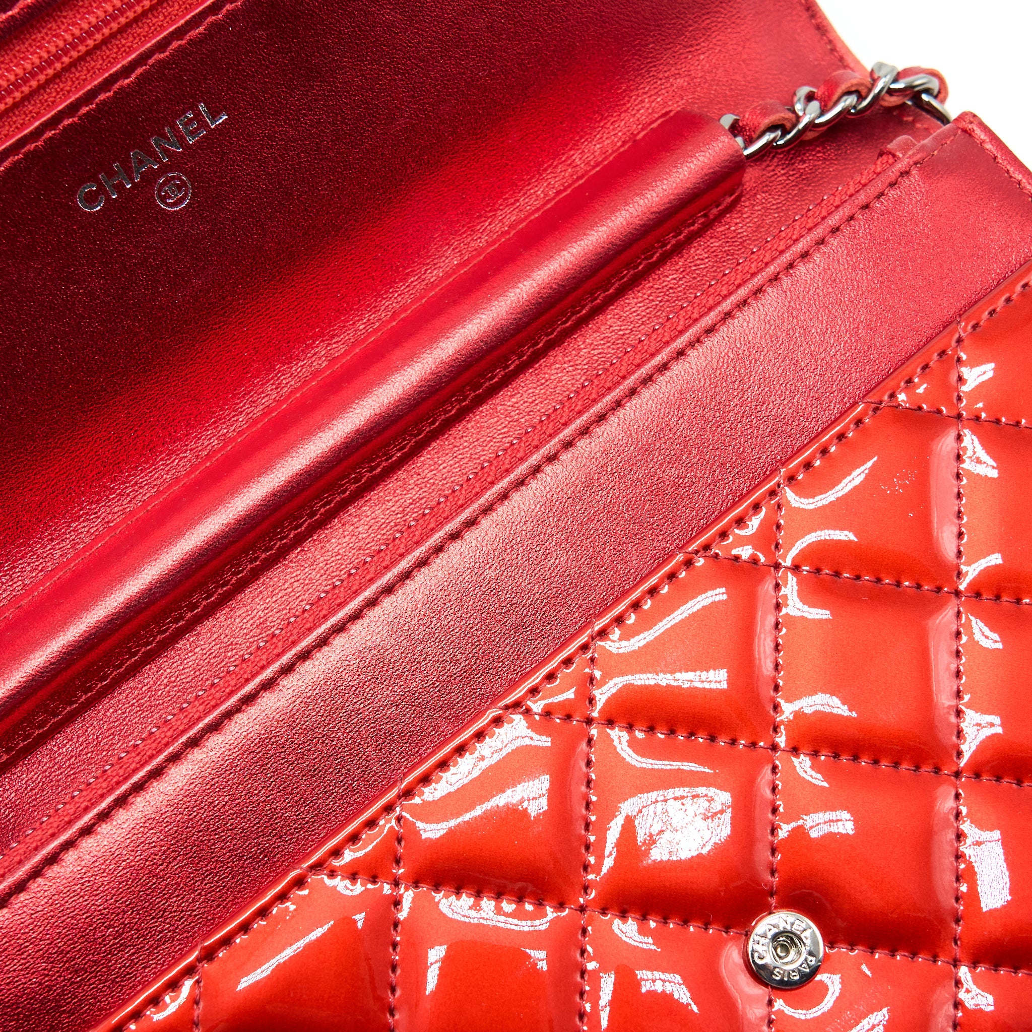CHANEL BOY WALLET ON CHAIN PATENT METALLIC RED SHW
