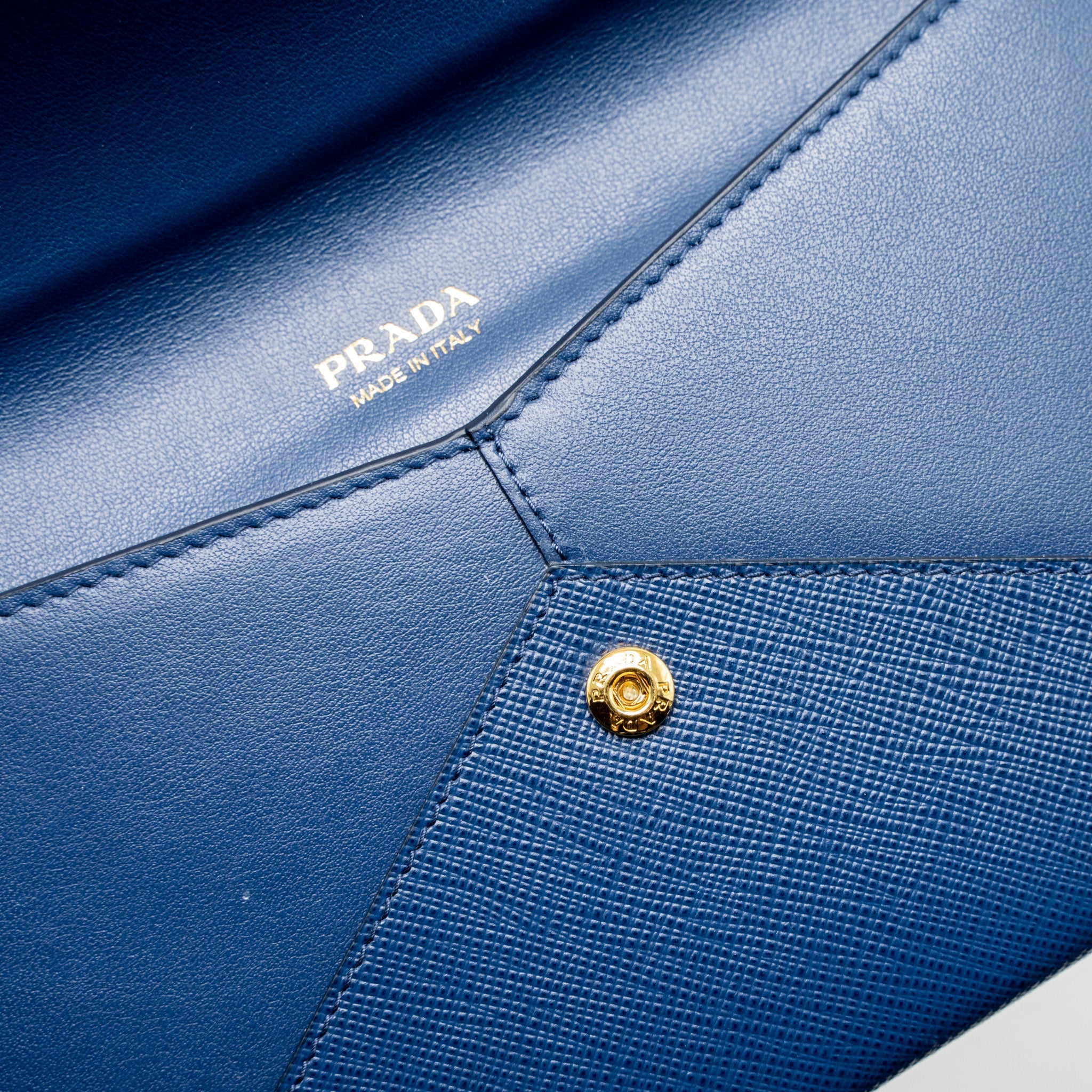 PRADA SAFFIANO CLUTCH CALFSKIN BLUE GHW