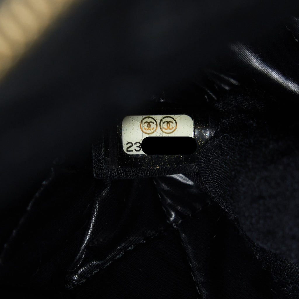 CHANEL QUILTED POUCH WITH TASSEL BLACK LGHW