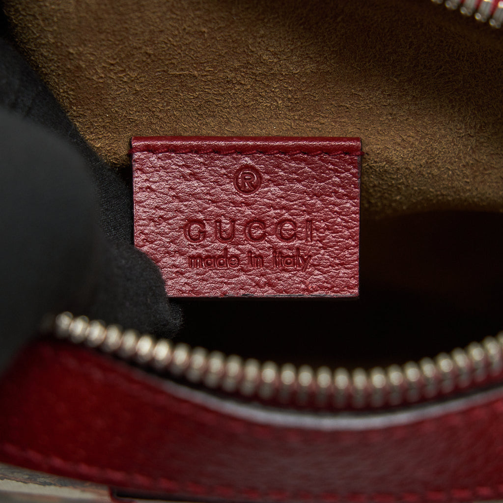 GUCCI PRINTED SUPREME CANVAS CAMERA BAG RED