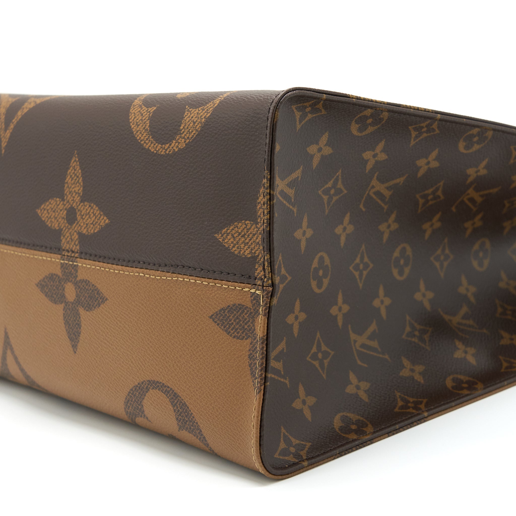 LOUIS VUITTON ON THE GO GM MONOGRAM REVERSE CANVAS GHW