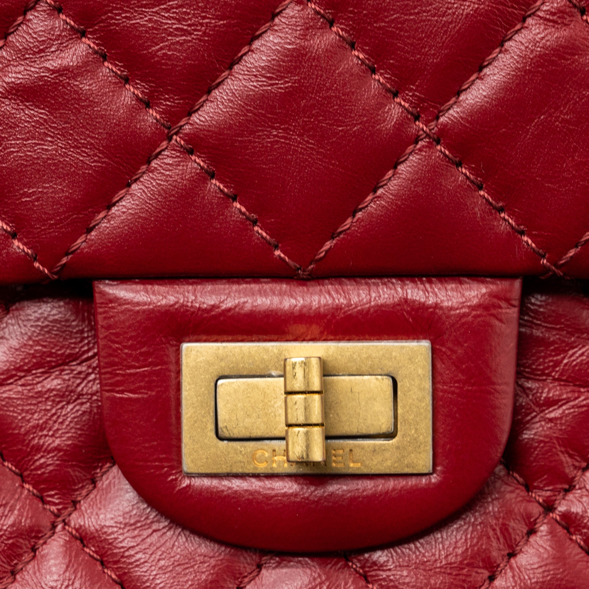CHANEL MINI 2.55 REISSUE FLAP BAG AGED CALFSKIN RED GHW