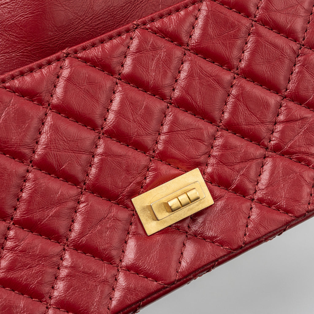 CHANEL MINI 2.55 REISSUE FLAP BAG AGED CALFSKIN RED GHW