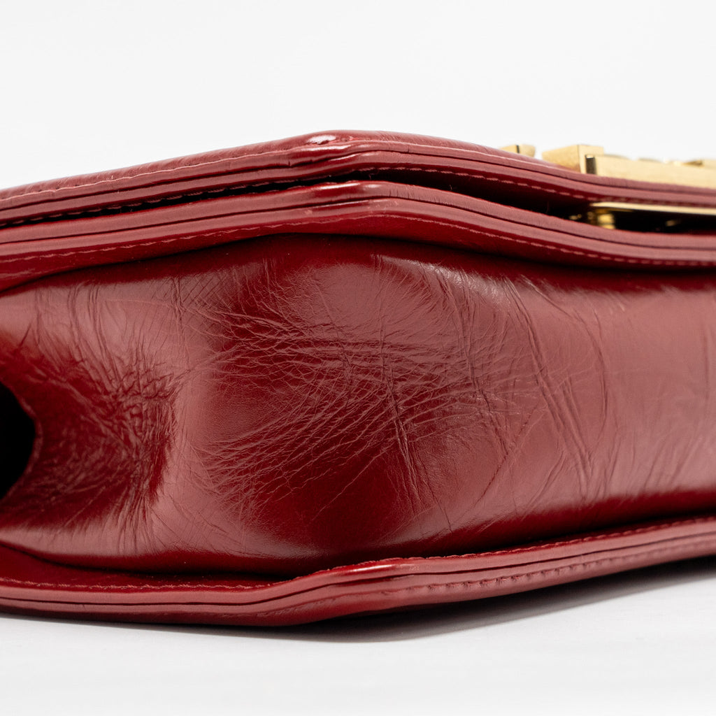 CHANEL SMALL JACKET BOY BAG AGED CALFSKIN RED GHW