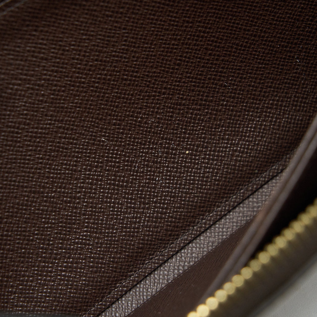 LOUIS VUITTON ZIPPY WALLET IN DAMIER EBENE